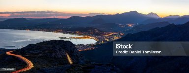 night-time-twilight-view-of-the-sea-and-town-of-port-pollenca-pollensa-in-north-mallorca[1].jpg
