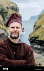 a-faroe-islander-wearing-a-traditional-faroese-wool-sweater-and-hat-in-gjogv-esturoy-in-the-fa...jpg
